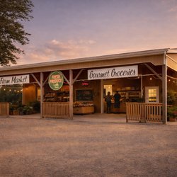 Lee & Maria's - The exterior of our farm market at sunset.