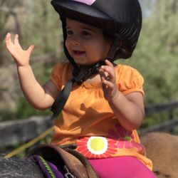 Thousand Hills Riding Stable - 15 month old enjoying her time on a pony.