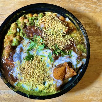 Usha Foods - Samosa Chaat. A tone of sweet, sour, spicy and savory all at once. - Indian Near Me - Floral Park, New York Usha Foods - Samosa Chaat. A tone of sweet, sour, spicy and savory all at once. - Indian Near Me - Floral Park, New York