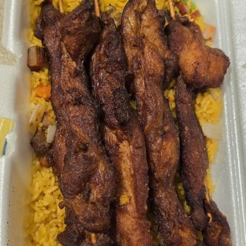 China Lite Restaurant - The Chicken on a Stick on top of the Pork Fried Ricd was plumpy, juicy, and delicious! - Chinese Near Me - Roanoke, Virginia