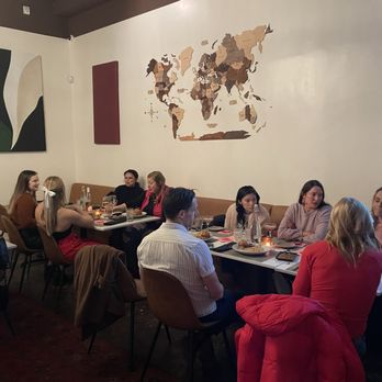 Brickland | Restaurant & Bar - Large group in back of restaurant - New American Near Me - Sacramento, California