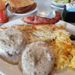 Biscuits and gravy with sausage patties underneath. Scrambled eggs done just right! Hash browns, could be a little crisper. Biscuits and gravy with sausage patties underneath. Scrambled eggs done just right! Hash browns, could be a little crisper.
