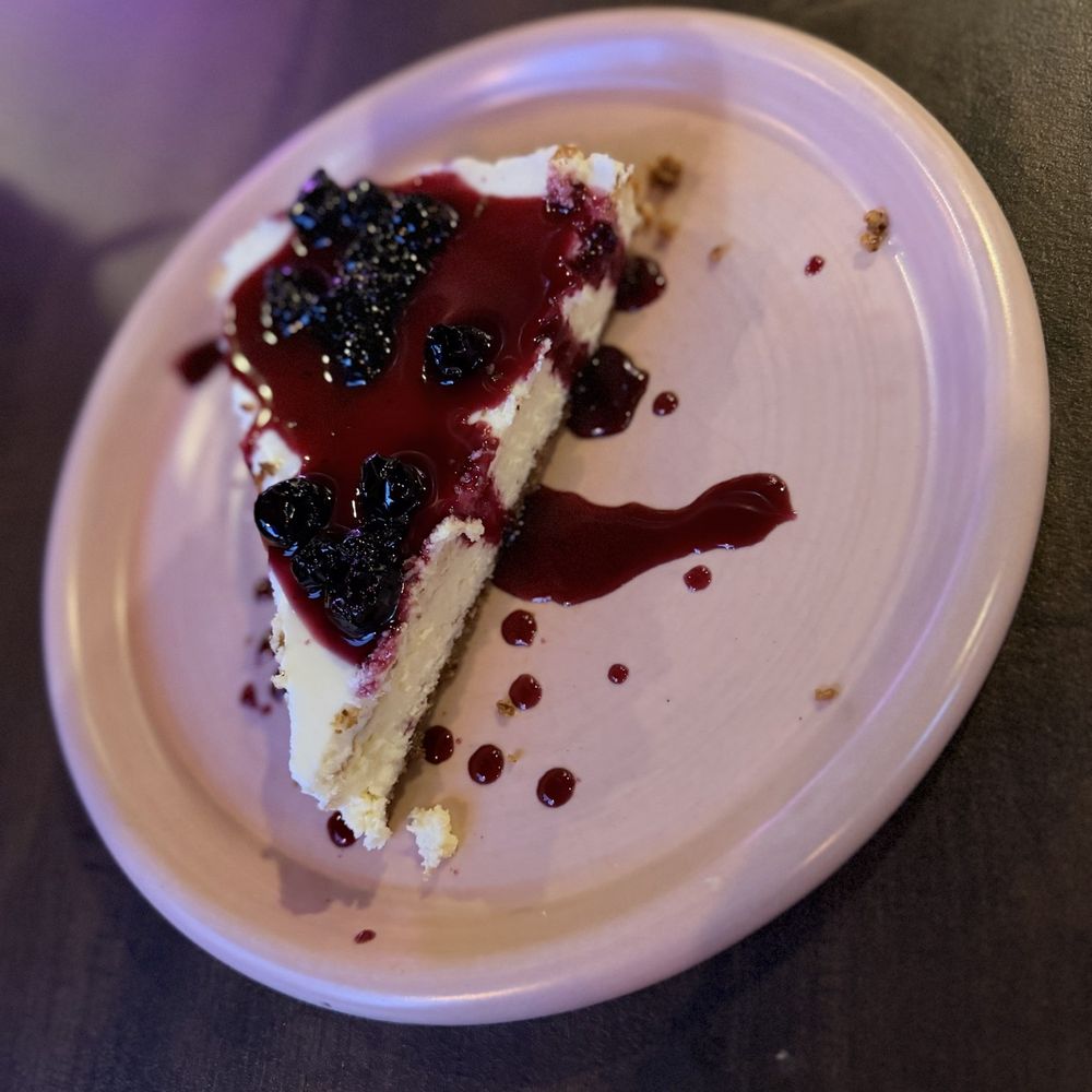 Walnut crusted cheesecake with berry compote Walnut crusted cheesecake with berry compote