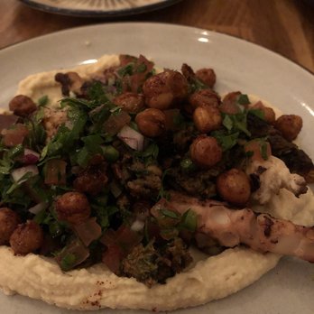 Abigail Street - Octopus buried under chickpeas in hummus - Mediterranean Near Me - Cincinnati, Ohio
