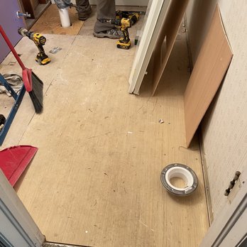 GBR Construction - a man working on a bathroom floor - General Contractors Near Me GBR Construction - a man working on a bathroom floor - General Contractors Near Me