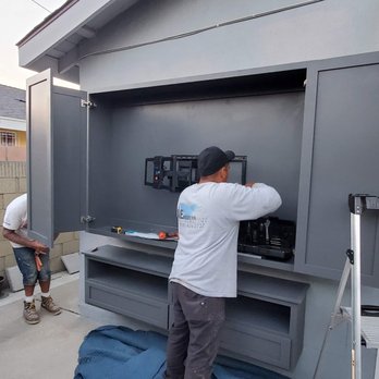 AE Modern Builders - two men working on an outdoor kitchen - General Contractors Near Me AE Modern Builders - two men working on an outdoor kitchen - General Contractors Near Me
