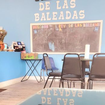 El Rey de las Baleadas - a classroom with chairs and a chalkboard - Honduran Near Me - Kansas City, Missouri