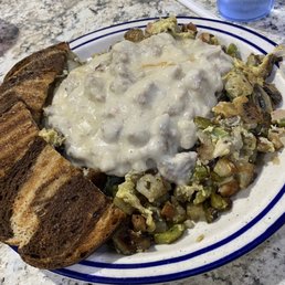 Slop with fresh sausage gravy Slop with fresh sausage gravy