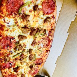 Pizza Hut - Customed Ultimate Flat ; pepperoni, sausage onions Green peppers Crafted Flatzz™