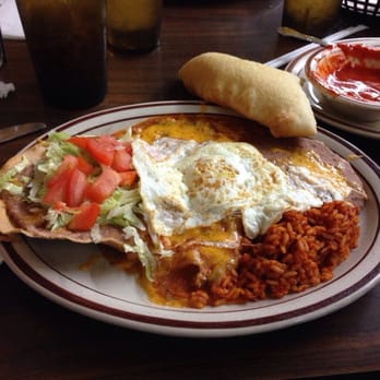 Jerry's Cafe - The tostada, cheese enchilada with over-easy egg on top. Sopapilla in the upper right.  Excellent meal! DELICIOUS! - New Mexican Cuisine Near Me - Gallup, New Mexico