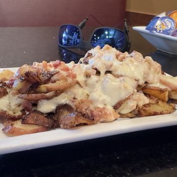 Keke's Breakfast Cafe - Potatoes with bacon and pepper jack cheese - Breakfast & Brunch Near Me - South Pasadena, Florida Keke's Breakfast Cafe - Potatoes with bacon and pepper jack cheese - Breakfast & Brunch Near Me - South Pasadena, Florida