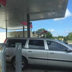 Citgo Gas - Covered bays all the way to inside. Great if it is raining.