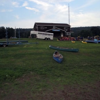 Lander's River Trips - The back of the main building.  You can see the canoes, rafts and tubes that are available for rent. - Rafting/Kayaking Near Me - Narrowsburg, New York