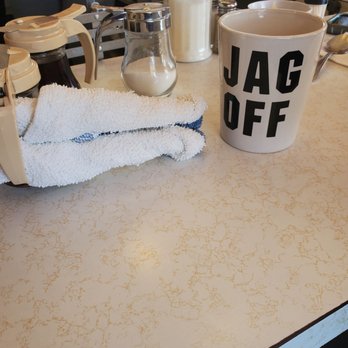 Charlie's Restaurant - a cup of coffee and a towel on a counter - Diners Near Me - Cleveland, Ohio