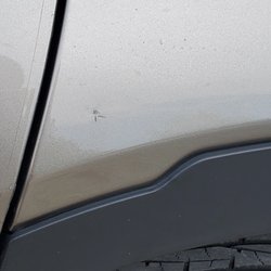 Sparkle Clean Car Wash - One of the dents / paint scratches caused by the damaged sprayer that hit our vehicle