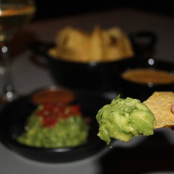 54thirty Rooftop - The Guacamole & Chips are served with House ancho-chili salsa (we added queso to our chips order). - Lounges Near Me - Denver, Colorado