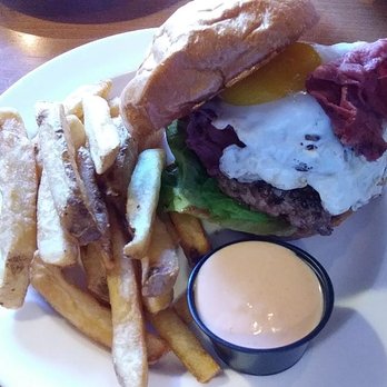Warrens Craft Burger - Pastrami burger topped with egg, cooked sunny-side up. - American Near Me - Ogden, Utah Warrens Craft Burger - Pastrami burger topped with egg, cooked sunny-side up. - American Near Me - Ogden, Utah