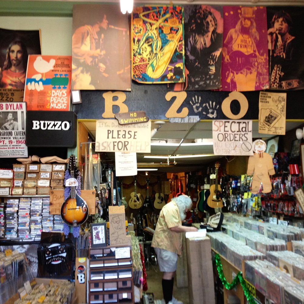 Buzzo Music - inside the store. that's Buzzo in the center of the photo. - Musical Instruments & Teachers Near Me - Geneseo, New York Buzzo Music - inside the store. that's Buzzo in the center of the photo. - Musical Instruments & Teachers Near Me - Geneseo, New York