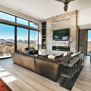 Highland Custom Homes - a living room with a view of the mountains - General Contractors Near Me - Park City, Utah Highland Custom Homes - a living room with a view of the mountains - General Contractors Near Me - Park City, Utah