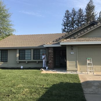 Mike's Landscaping & Hardscape - a man painting a house - Landscaping Near Me Mike's Landscaping & Hardscape - a man painting a house - Landscaping Near Me