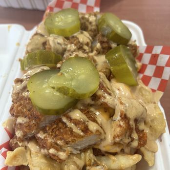 That Mother Clucker - Secret menu item, had tots, fries Mac and cheese with chicken sauce and pickles - Food Trucks Near Me - Hesperia, California