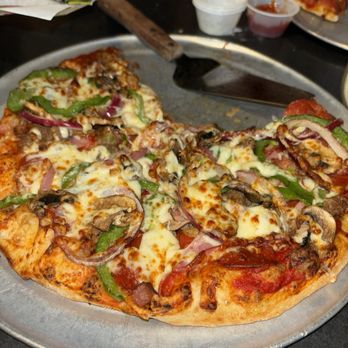 Fox's Pizza Den - super deluxe pizza - Pizza Near Me - Prattville, Alabama