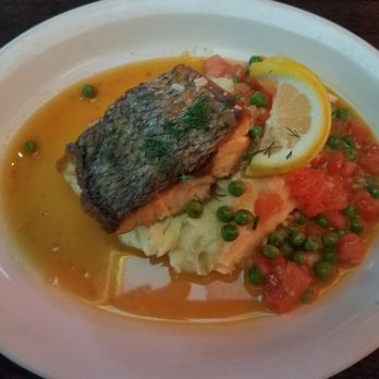 Dinerbar - Striped bass with tomatoes and peas atop mashed potatoes - Diners Near Me - Rego Park, New York Dinerbar - Striped bass with tomatoes and peas atop mashed potatoes - Diners Near Me - Rego Park, New York