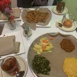 Vegetarian Combo for me , Lamb tibs Fir Fir for our daughter with their delicious tea !! Vegetarian Combo for me , Lamb tibs Fir Fir for our daughter with their delicious tea !!