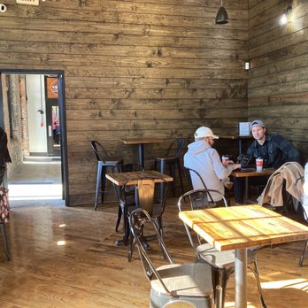 Just Love Coffee Cafe - people sitting at tables - Coffee & Tea Near Me - Nashville, Tennessee Just Love Coffee Cafe - people sitting at tables - Coffee & Tea Near Me - Nashville, Tennessee