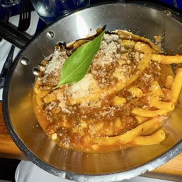 Boar Raghu and pasta