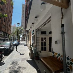 Liberty kitchen - Unassuming storefront with a place to rest your beverage while you grab a smoke.