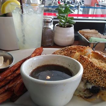 Floret - French dip with yam fries and a glass of rosemary lemonade - Vegetarian Near Me - Seattle, Washington Floret - French dip with yam fries and a glass of rosemary lemonade - Vegetarian Near Me - Seattle, Washington