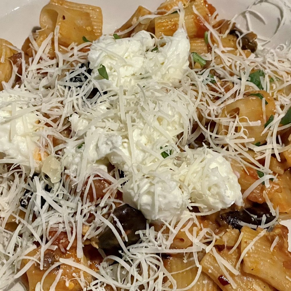 Mia Francesca - a plate of pasta with cheese and olives - Italian Near Me - Chicago, Illinois Mia Francesca - a plate of pasta with cheese and olives - Italian Near Me - Chicago, Illinois