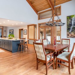Semper Fi Custom Remodeling - Kitchen and dining room area upgraded with open concept and beautiful hardwood floors.