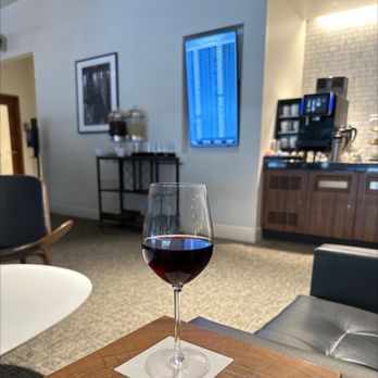 The Centurion Lounge - Free wine and in the background free coffee - Airport Lounges Near Me - Dallas, Texas The Centurion Lounge - Free wine and in the background free coffee - Airport Lounges Near Me - Dallas, Texas