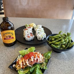 Happy hour snacks!  Edemame, spicy tuna roll, California rolls, and my favorite tuna taco!