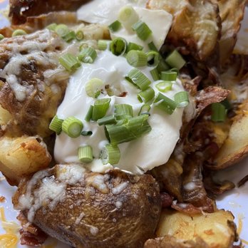 Sax's Joint - Potato skin with bacon, cheese and sour cream - Breakfast & Brunch Near Me - Petaluma, California Sax's Joint - Potato skin with bacon, cheese and sour cream - Breakfast & Brunch Near Me - Petaluma, California