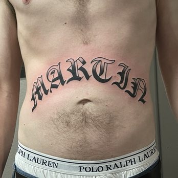 Black Lotus Tattooers - Last name stomach bomber tattoo done by Tyler - Tattoo Near Me - Gilbert, Arizona