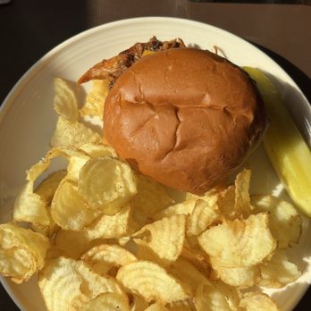 The Watershed Cafe - Pulled pork sandwich with chips - Comfort Food Near Me - Osceola, Wisconsin The Watershed Cafe - Pulled pork sandwich with chips - Comfort Food Near Me - Osceola, Wisconsin