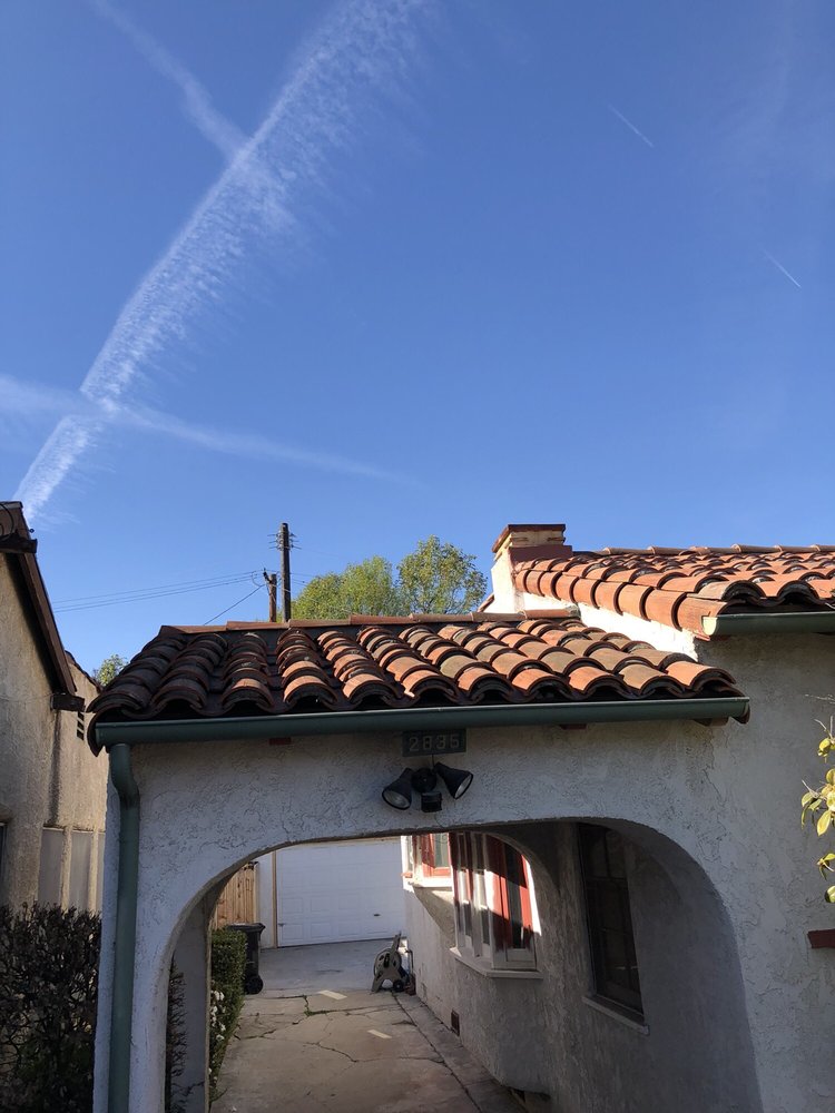 Slide of Eric's Roofing