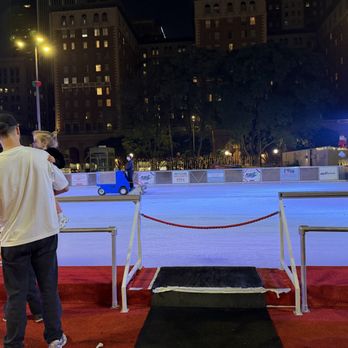 Holiday Ice Rink - Smoothing out the ice for the next session - Skating Rinks Near Me - Los Angeles, California Holiday Ice Rink - Smoothing out the ice for the next session - Skating Rinks Near Me - Los Angeles, California