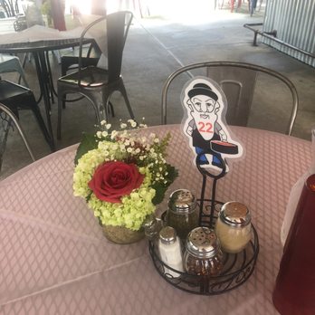 Burt's Place - A table on the patio. - Pizza Near Me - Morton Grove, Illinois Burt's Place - A table on the patio. - Pizza Near Me - Morton Grove, Illinois