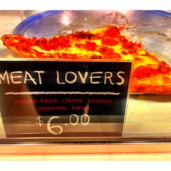 Pazza Pizza - Slice Meat Lovers Pizza @ PAZZA PIZZA. (Under Sedgwick CTA Brown/Purple Station. Delivery Pickup . Pizza/Sandwiches/Salads. Cool!