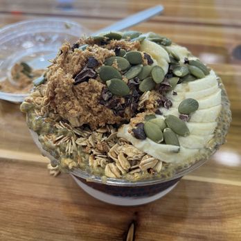Nautical Bowls - Loaded up seasonal pumpkin bowl (coconut and acai base, pumpkin spice chia seed pudding, cinnamon granola, banana, pumpkin seeds, PB) - Acai Bowls Near Me - Huntsville, Alabama