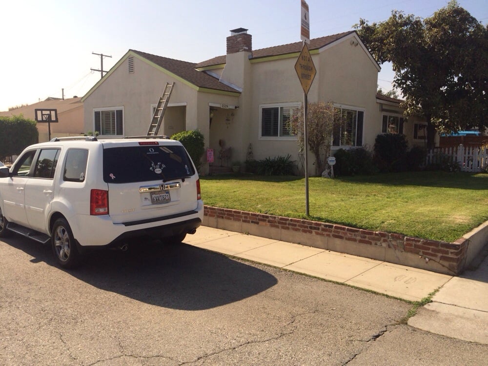 Slide of De Lorenzo's Guaranteed Roofing