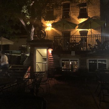 The Contented Cow - a patio area at night - Pubs Near Me - Northfield, Minnesota The Contented Cow - a patio area at night - Pubs Near Me - Northfield, Minnesota