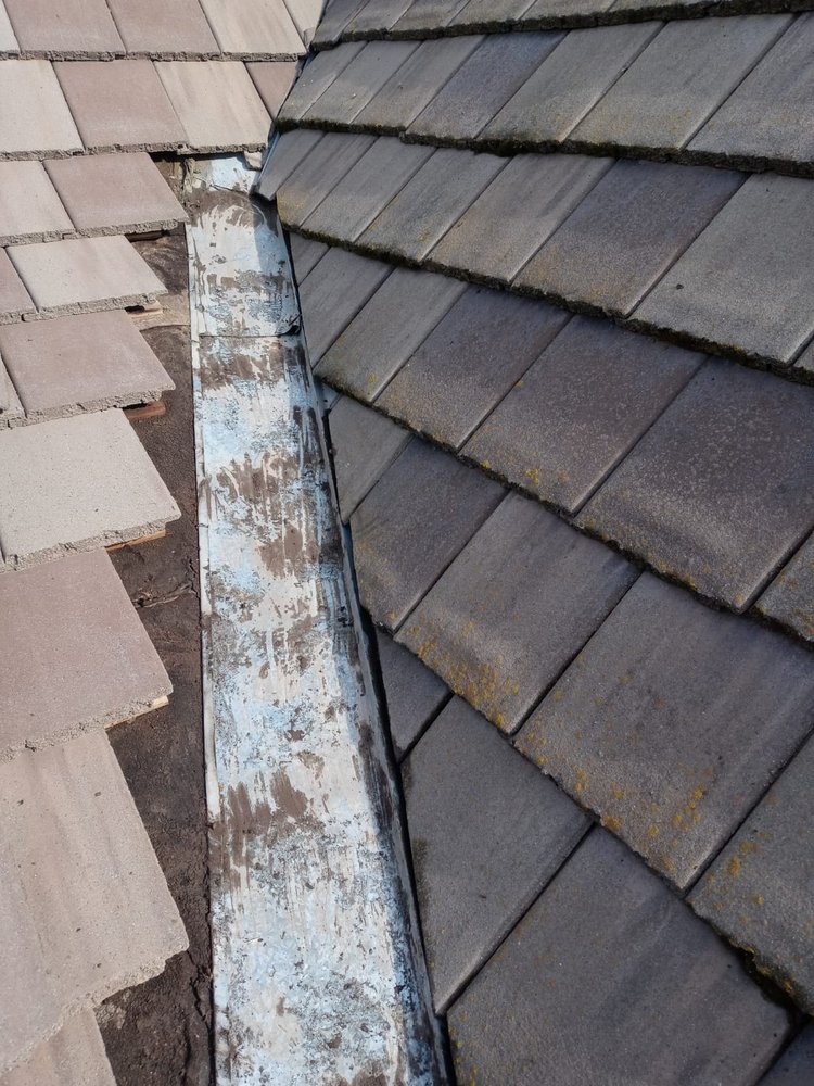 Slide of GT Roofing Services