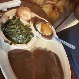 Salisbury steak with mashed potatoes and greens Salisbury steak with mashed potatoes and greens