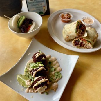 Dashi - Five spice pork belly steam bun, chili marinated fried chicken banh mi wrap and dashi chic & chorizo fritters. - Food Trucks Near Me - North Charleston, South Carolina