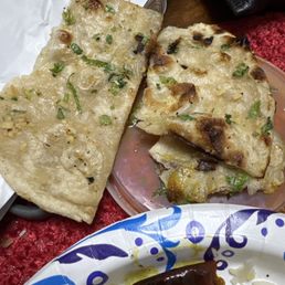 Garlic naan-undercooked and wilty.